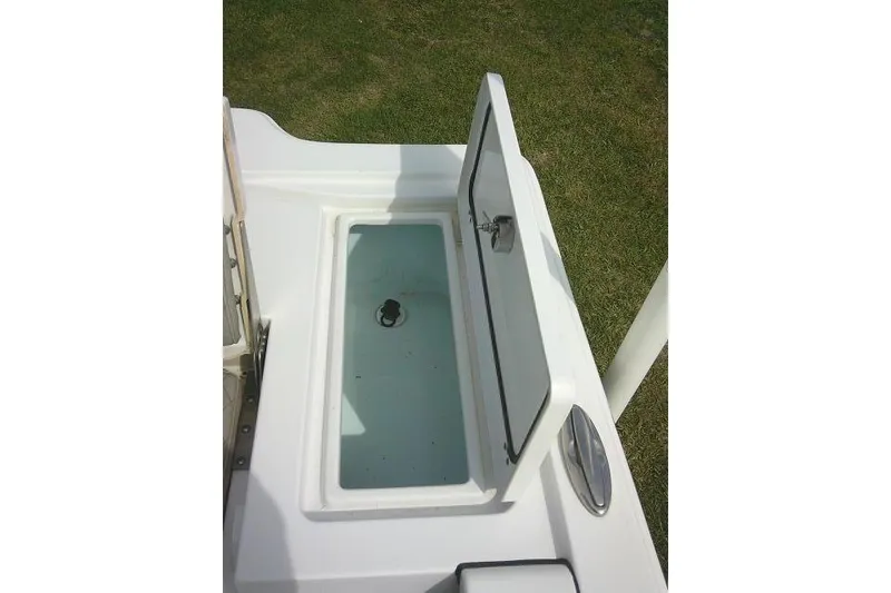 Slide: The Image of Open storage compartment on 2022 Sportsman Tournament 214 Bay Boat. - 44