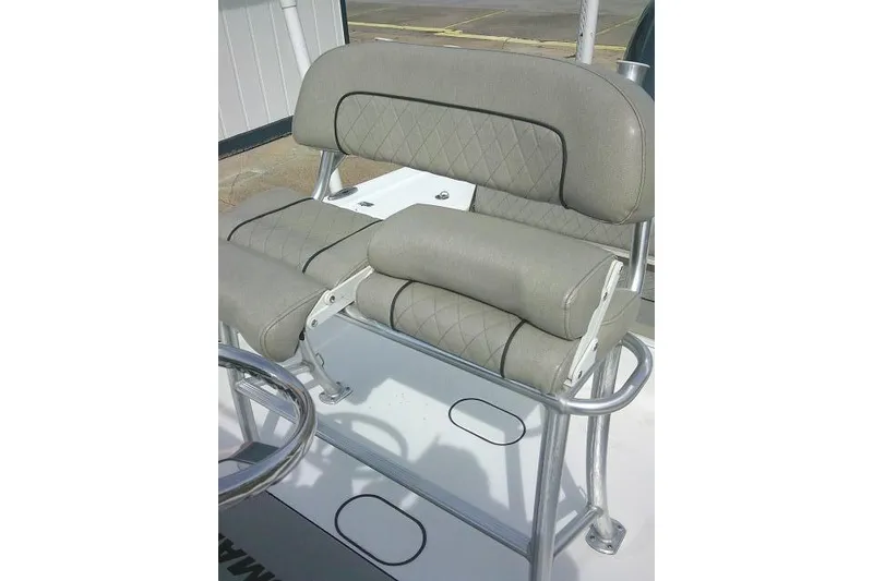 Slide: The Image of Gray seating on 2022 Sportsman Tournament 214 Bay Boat, featuring diamond-pattern upholstery. - 50