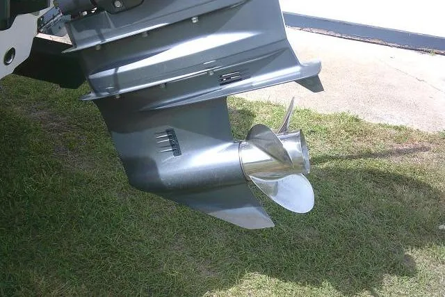 Slide: The Image of Propeller of 2022 Sportsman Tournament 214 Bay Boat on grass. - 6