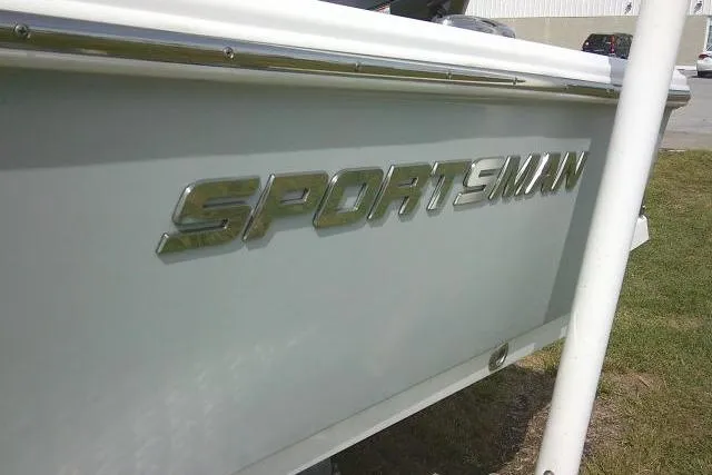 Slide: The Image of 2022 Sportsman Tournament 214 Bay Boat side view with logo. - 8