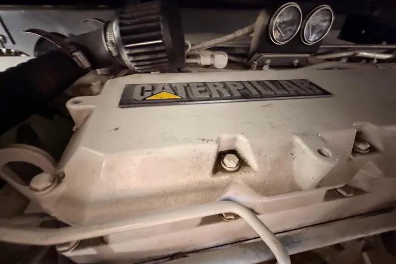 Slide: The Image of Caterpillar engine in a 1998 Sea Ray 420 Aft Cabin yacht, close-up view. - 94