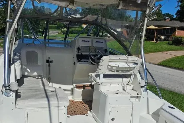 Slide: The Image of 2007 Sailfish 30-06 Express boat interior with seating and navigation equipment. - 5