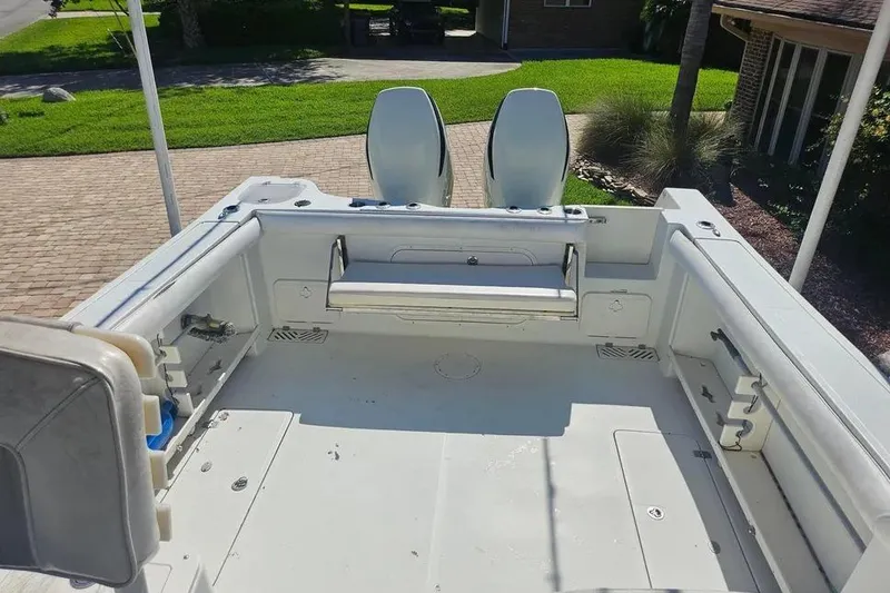 Slide: The Image of 2007 Sailfish 30-06 Express boat interior with seating and storage compartments. - 7