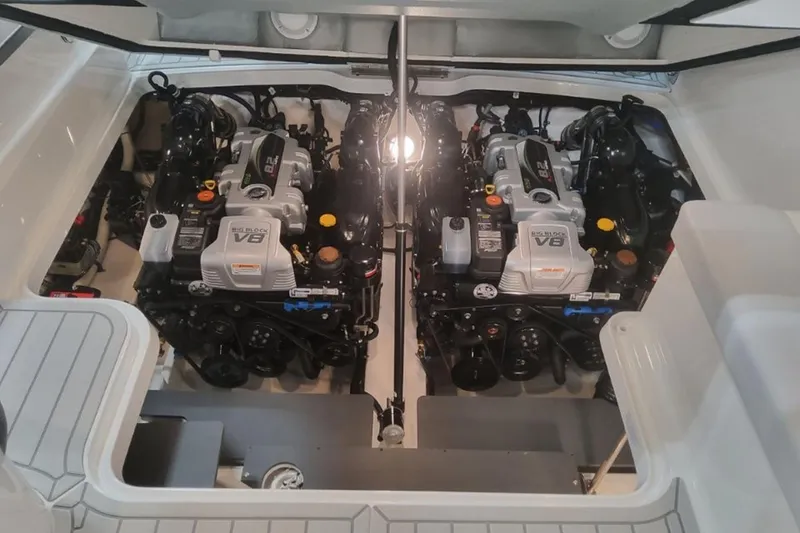 Slide: The Image of Engine compartment of 2026 Formula 330 Crossover Bowrider I/O with dual V8 engines. - 8