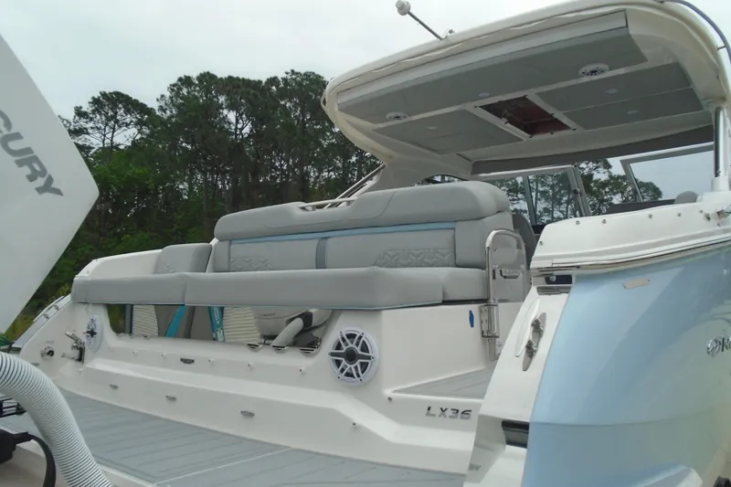 Slide: The Image of 2026 Regal LX36 luxury boat with spacious seating and modern design. - 11