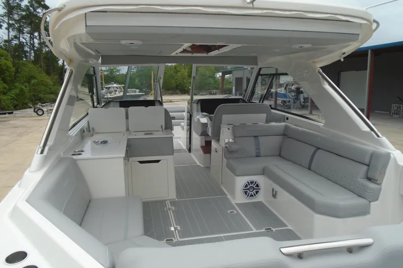 Slide: The Image of 2026 Regal LX36 boat interior with spacious seating and modern design. - 12