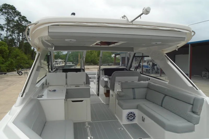 Slide: The Image of 2026 Regal LX36 boat interior with spacious seating and modern design. - 13