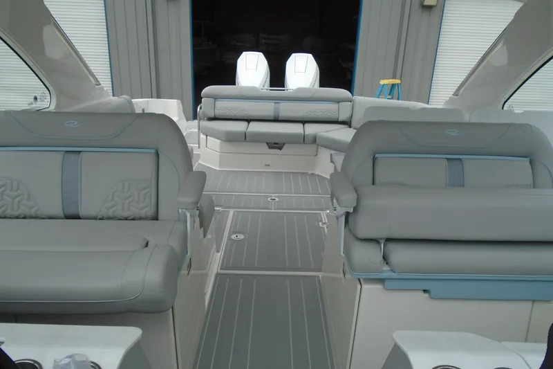 Slide: The Image of Luxurious interior of 2026 Regal LX36 boat with plush seating and modern design. - 19