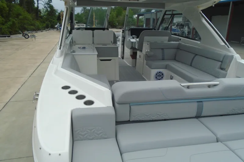 Slide: The Image of 2026 Regal LX36 luxury boat interior with spacious seating and modern amenities. - 28