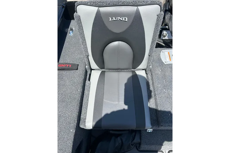 Slide: The Image of 2026 Lund 1875 Impact XS Sport boat seat, gray and black design, with logo. - 25