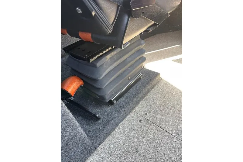 Slide: The Image of Boat seat base in 2018 Thunder Jet Luxor Limited, featuring adjustable support and orange accents. - 13