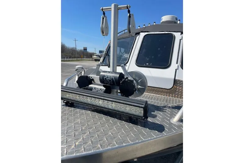 Slide: The Image of 2018 Thunder Jet Luxor Limited boat deck with fishing equipment and light bar. - 3