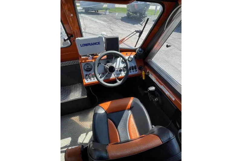 Slide: The Image of 2018 Thunder Jet Luxor Limited boat cockpit with Lowrance navigation system. - 4