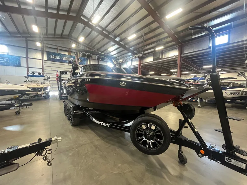 The Image of 2022 MasterCraft XStar S boat in a showroom. - 1