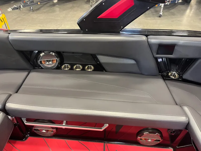 Slide: The Image of Interior of 2022 MasterCraft XStar S with speakers and seating upholstery. - 12