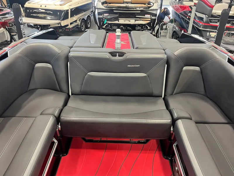Slide: The Image of Interior of 2022 MasterCraft XStar S with gray leather seating. - 13