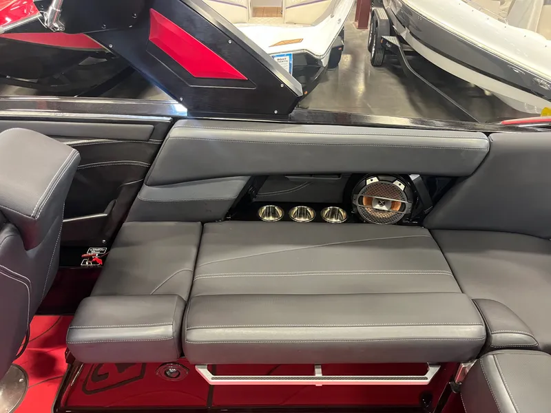 Slide: The Image of Interior of a 2022 MasterCraft XStar S with gray leather seating. - 14