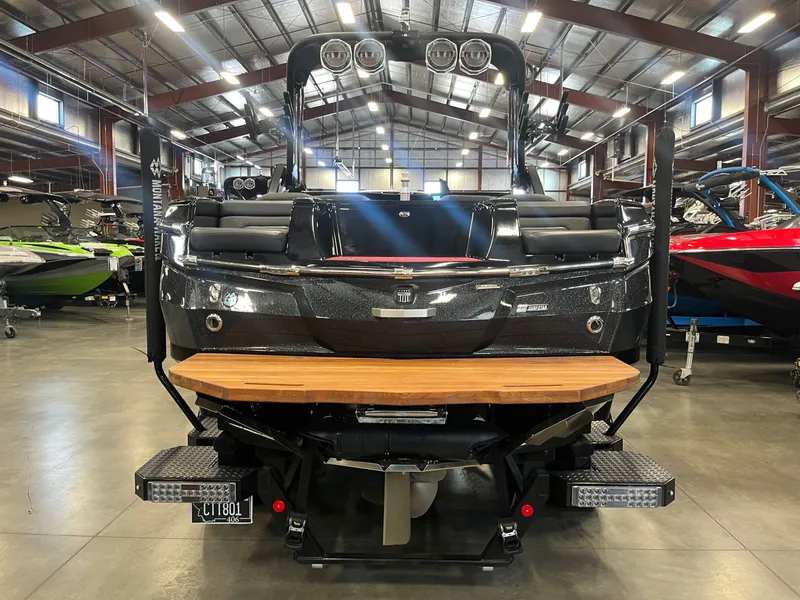 Slide: The Image of 2022 MasterCraft XStar S boat in showroom. - 4