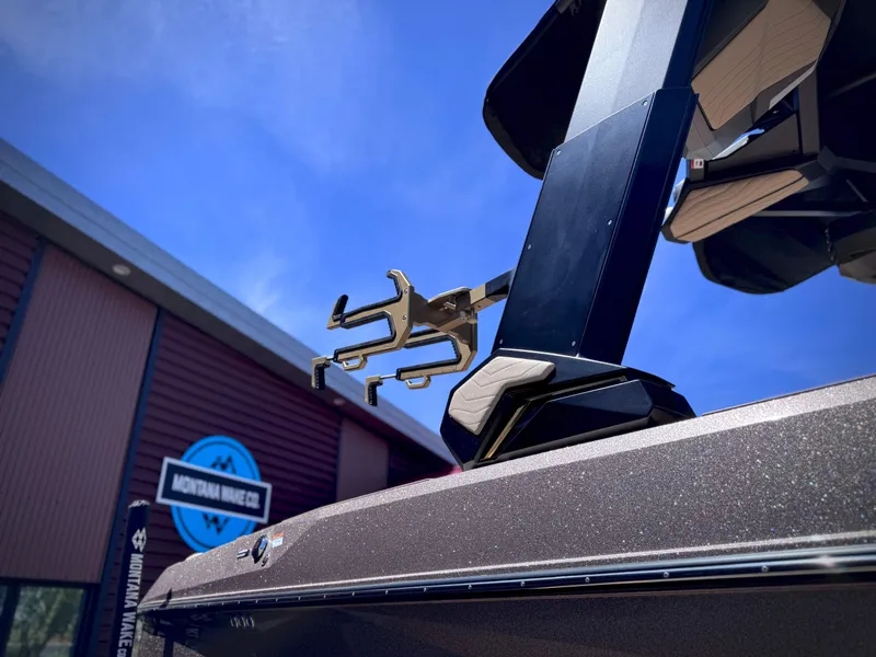 Slide: The Image of 2026 Nautique G25 boat in front of Montana Wake Co. building. - 19
