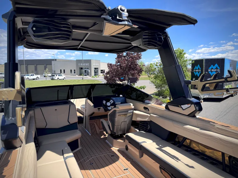 Slide: The Image of Interior of 2026 Nautique G25 boat with luxurious features. - 21