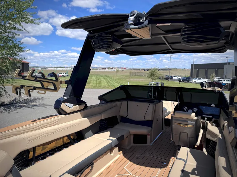 Slide: The Image of Interior of 2026 Nautique G25 boat with luxurious features. - 22