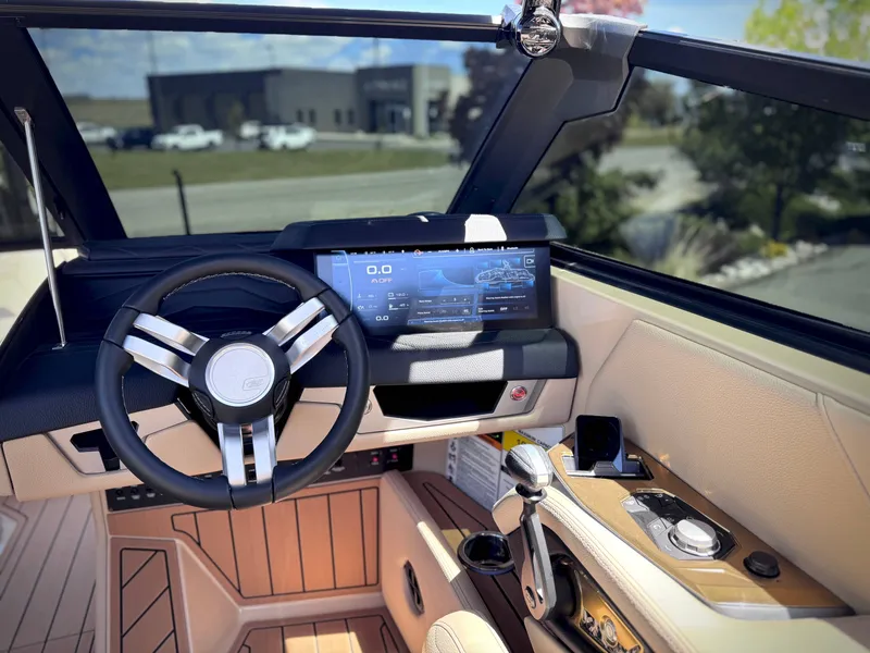 Slide: The Image of 2026 Nautique G25 interior with modern dashboard design. - 23