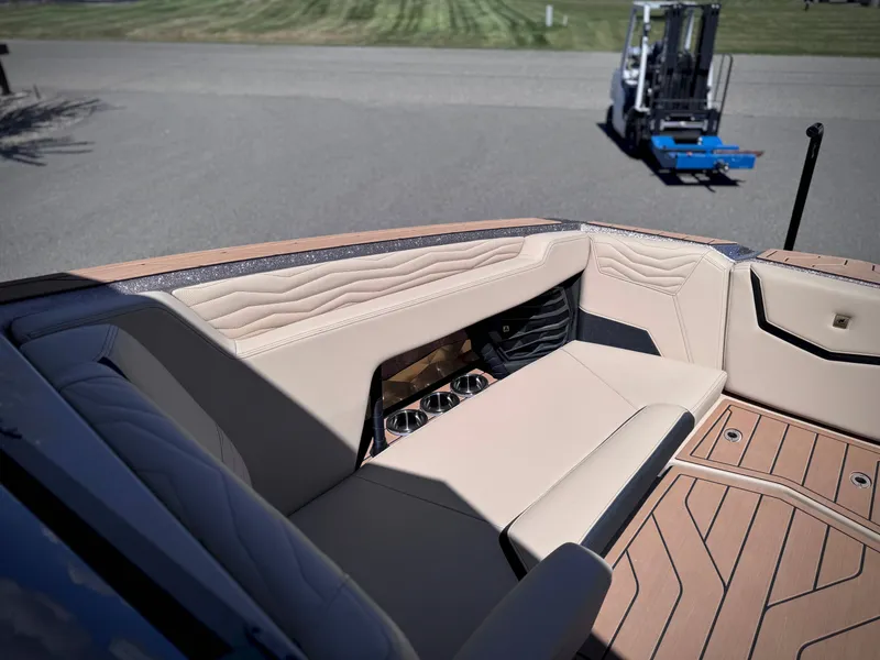 Slide: The Image of Interior of 2026 Nautique G25 with luxurious seating. - 25