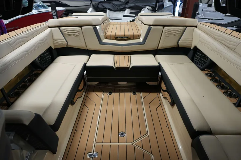 Slide: The Image of Interior of 2026 Nautique G25 with luxurious seating. - 9