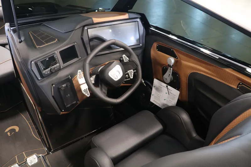 Slide: The Image of Interior of 2025 Centurion Fe23 with modern dashboard and steering wheel. - 11