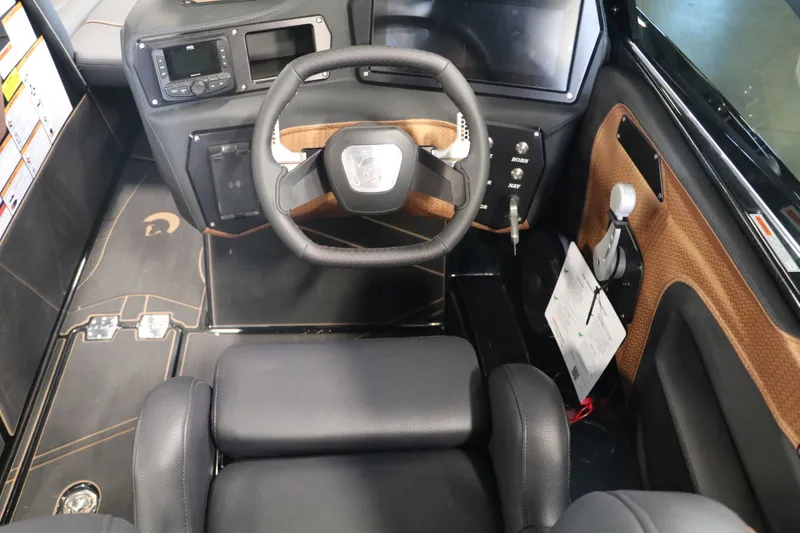 Slide: The Image of Interior of 2025 Centurion Fe23 with modern steering wheel and dashboard. - 12