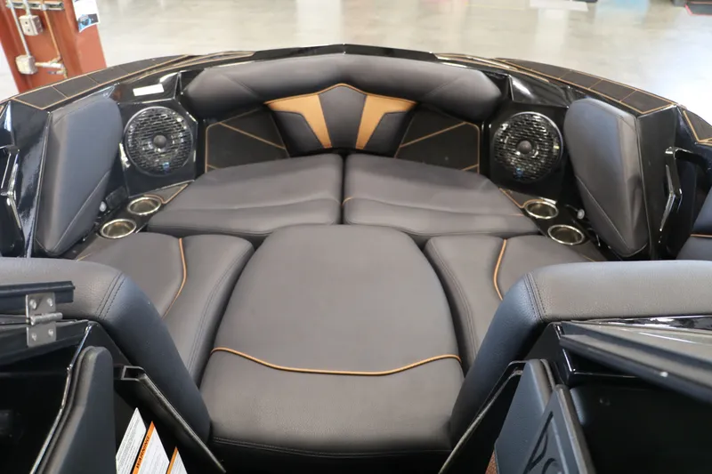 Slide: The Image of Interior of 2025 Centurion Fe23 with luxurious seating and speakers. - 16