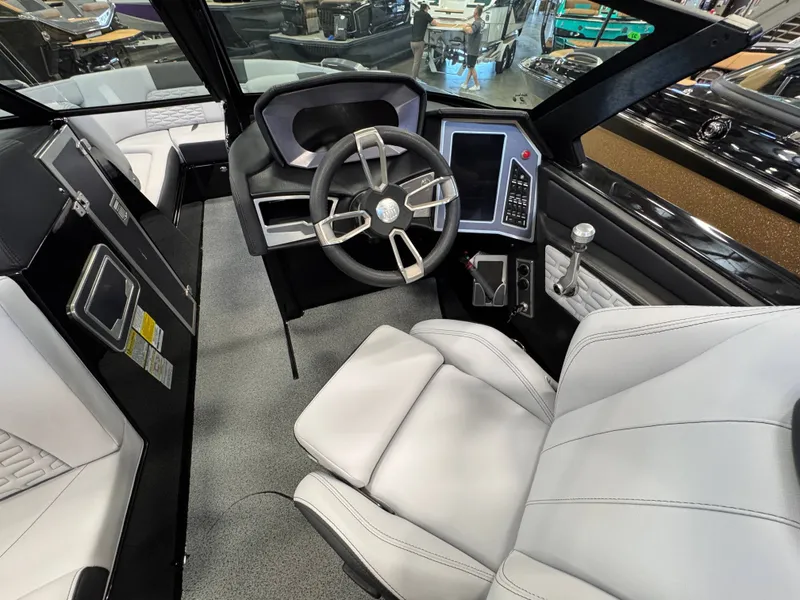 Slide: The Image of Interior of 2023 MasterCraft X24 boat with modern helm station. - 6