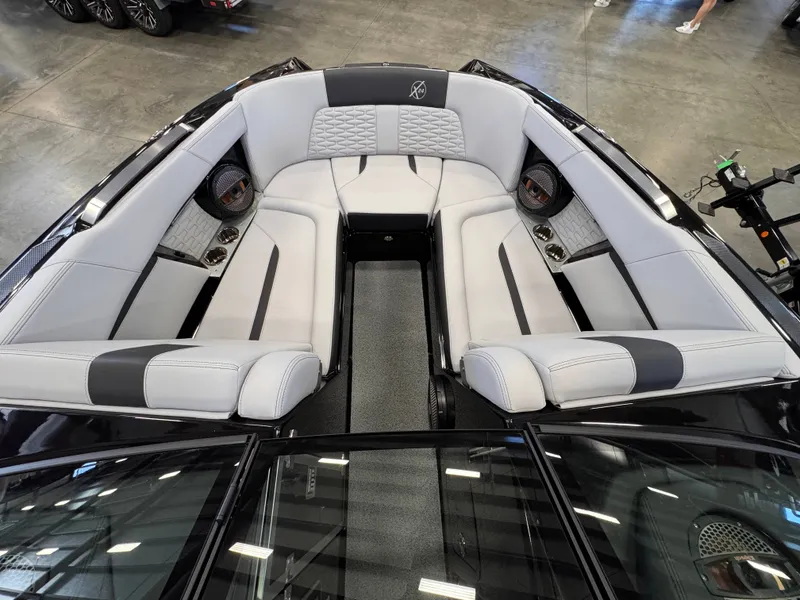 Slide: The Image of Interior of 2023 MasterCraft X24 boat with luxurious seating. - 7