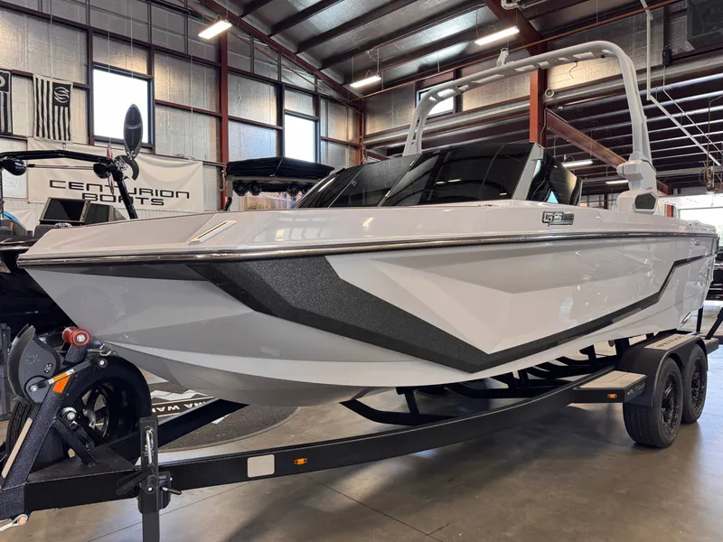 The Image of 2026 Nautique Super Air Nautique GS22 boat in a showroom. - 1