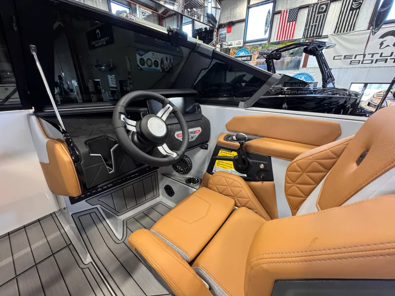 Slide: The Image of 2026 Nautique Super Air Nautique GS22 interior with luxurious leather seating. - 12