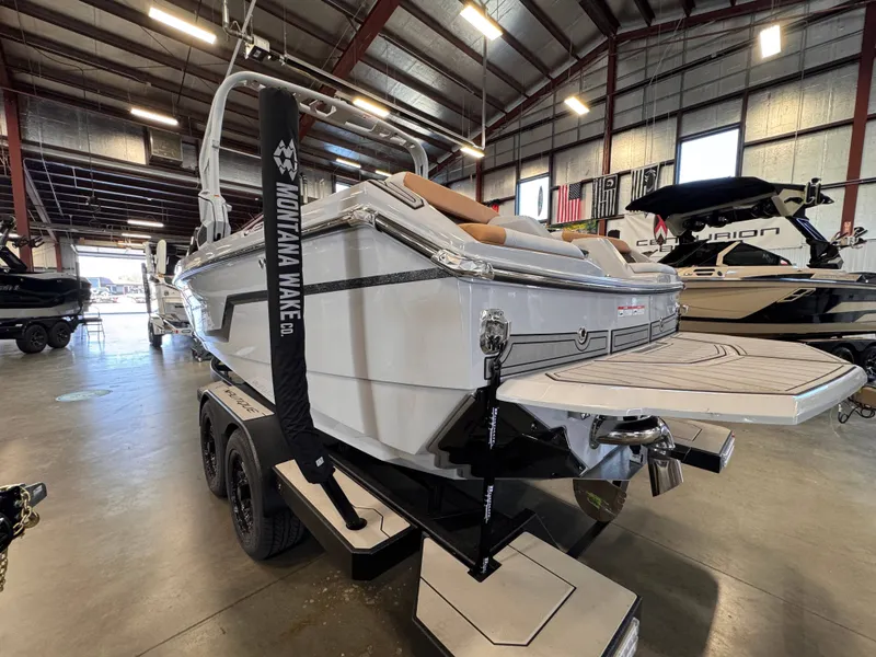 Slide: The Image of 2026 Nautique Super Air Nautique GS22 in a boat workshop. - 3