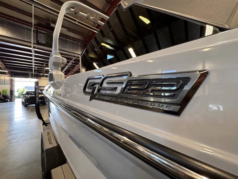 Slide: The Image of 2026 Nautique Super Air Nautique GS22 boat in warehouse. - 7