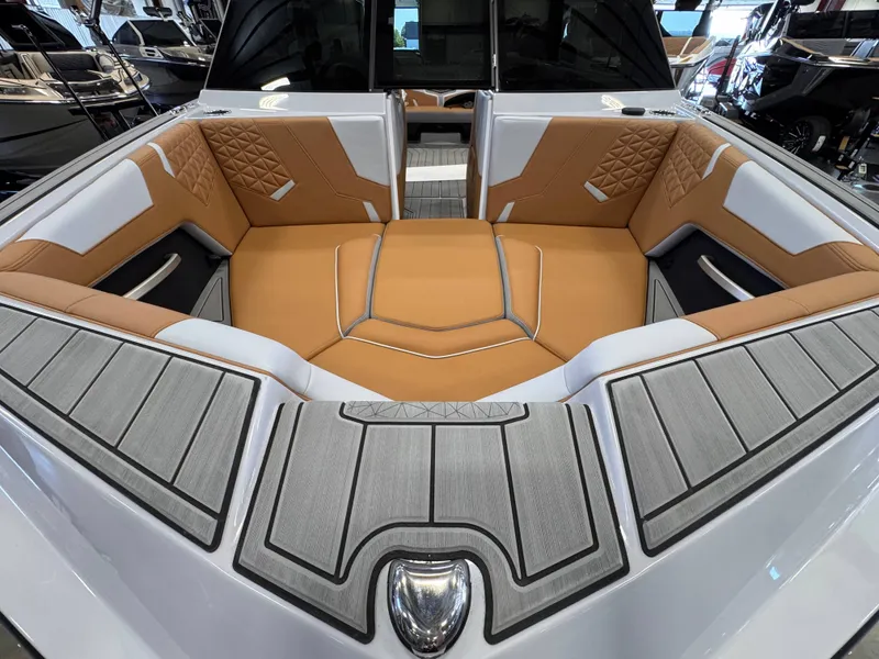 Slide: The Image of Interior of 2026 Nautique Super Air Nautique GS22 with luxurious seating. - 8