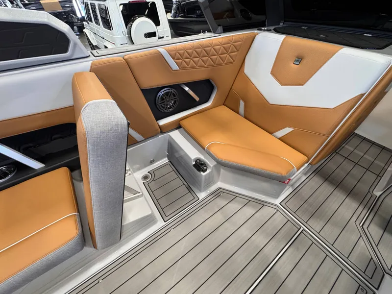 Slide: The Image of 2026 Nautique Super Air Nautique GS22 interior with luxurious seating. - 9