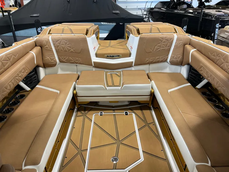The Image of Interior of 2026 Nautique Super Air Nautique G23 Paragon with luxurious seating. - 12