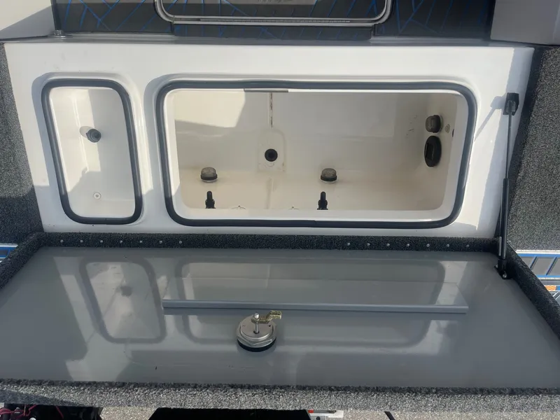 Slide: The Image of Interior view of 2024 Caymas DV 22 boat compartment. - 18