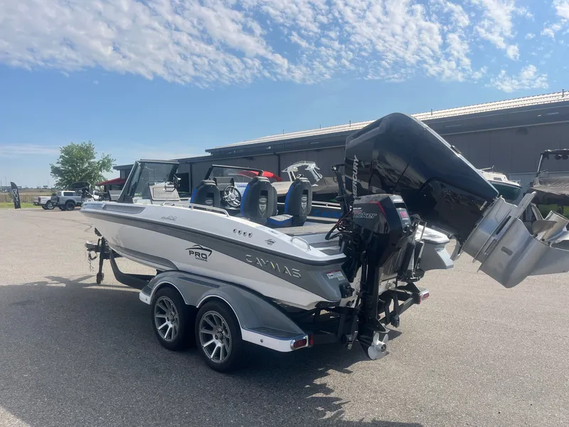 Slide: The Image of 2024 Caymas DV 22 boat with trailer in parking lot. - 5
