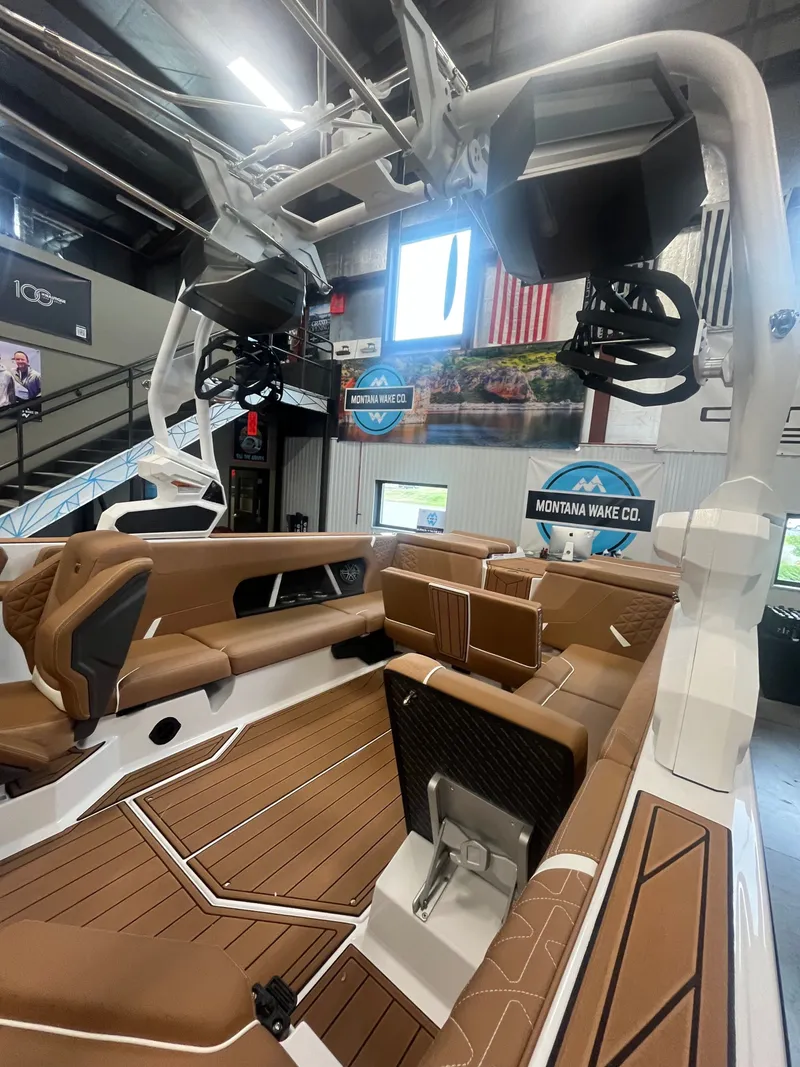 Slide: The Image of Interior view of 2026 Nautique GS24 boat at Montana Wake Co. - 4