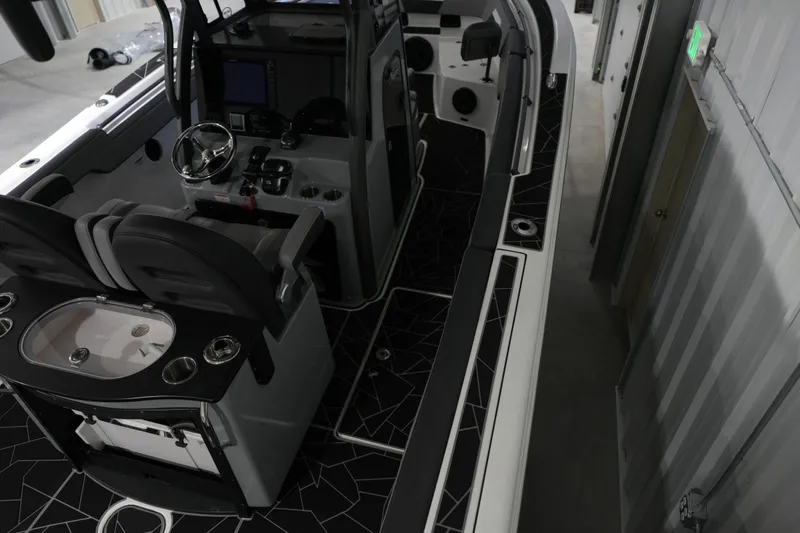 Slide: The Image of Interior view of 2025 Sea Pro 292 DLX with modern features. - 5
