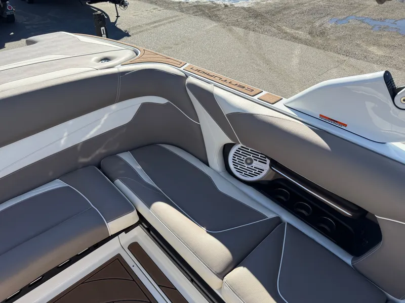 Slide: The Image of Interior of a 2020 Centurion Ri237 boat with gray upholstery. - 11