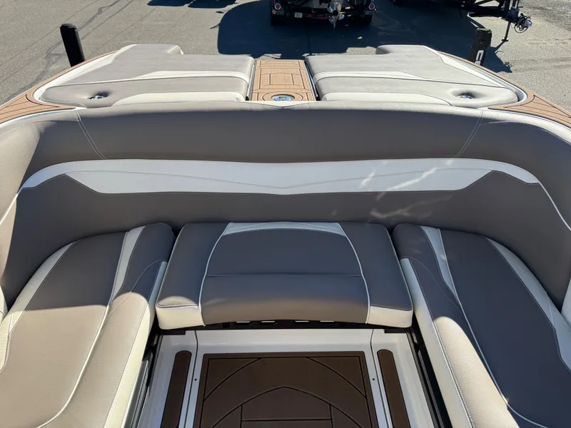 Slide: The Image of Interior of a 2020 Centurion Ri237 boat with gray upholstery. - 12