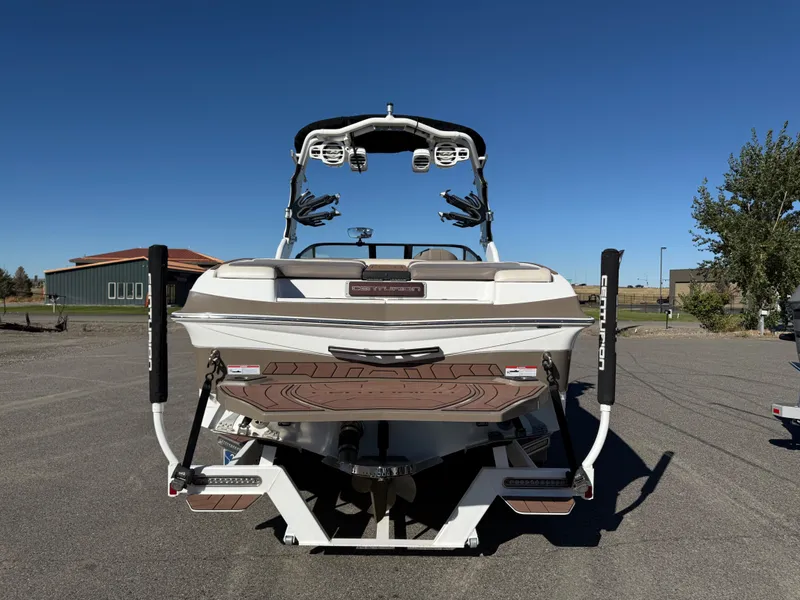 Slide: The Image of Rear view of a 2020 Centurion Ri237 boat in a parking lot. - 5