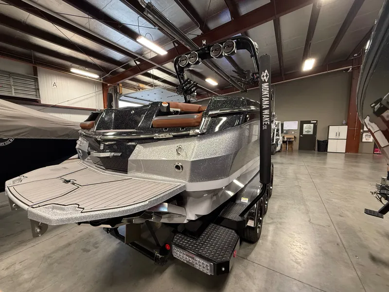 The Image of 2023 MasterCraft X STAR S boat in warehouse. - 3