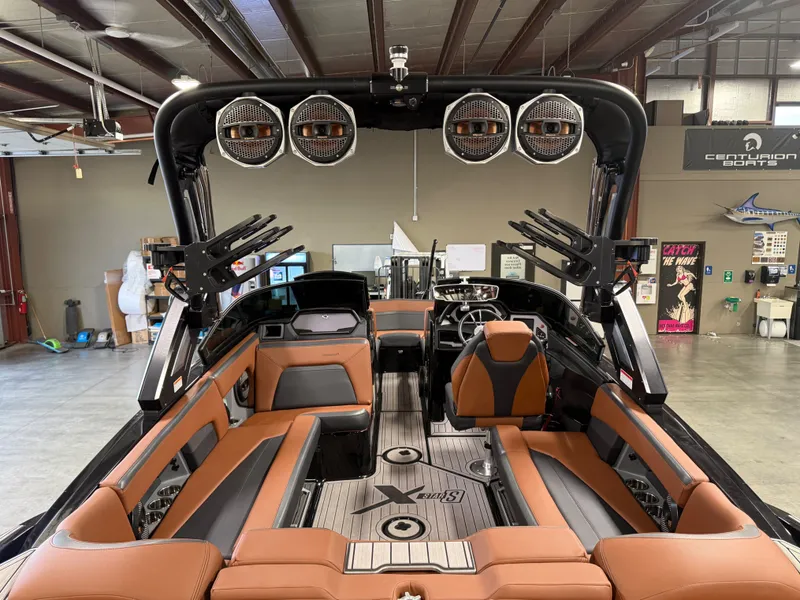 Slide: The Image of Interior view of 2023 MasterCraft X STAR S boat in a workshop. - 9