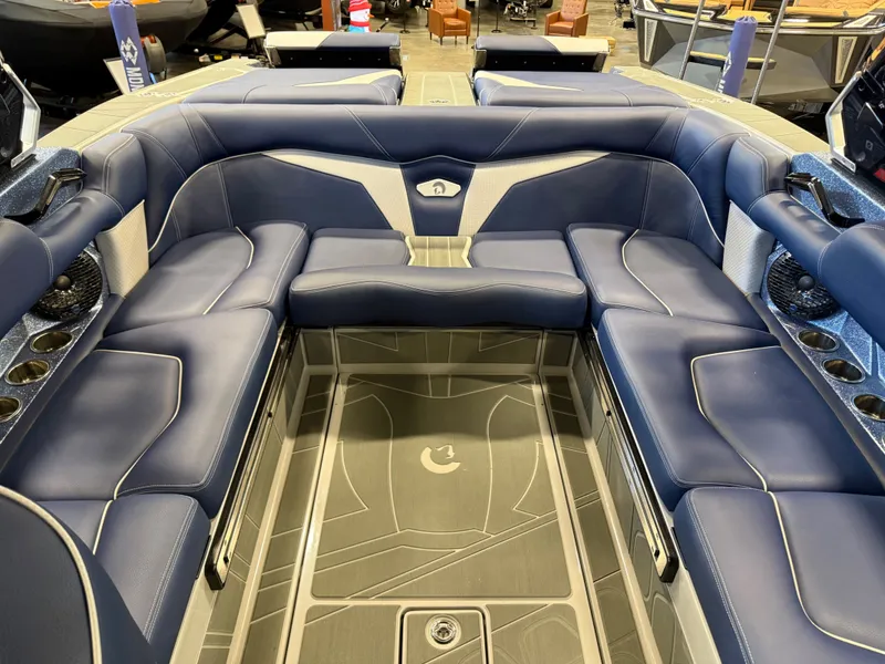 Slide: The Image of Interior of Centurion Fe23 boat, luxurious blue upholstery, model year 2026. - 11